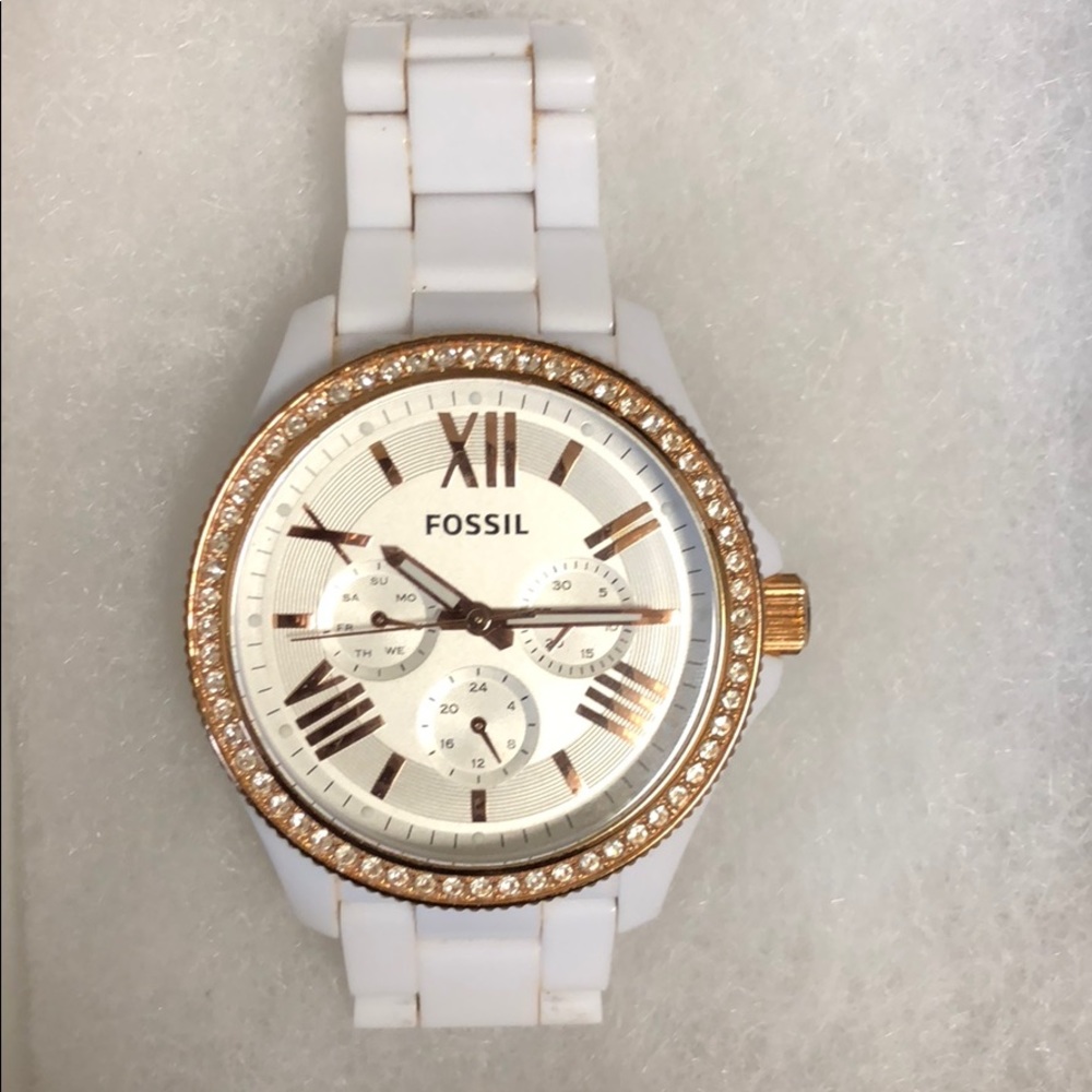 Fossil white and rose gold watch